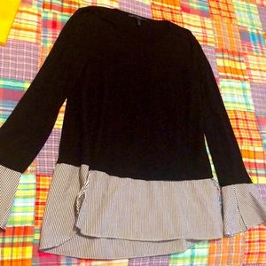 Black shirt with striped trim bottom
